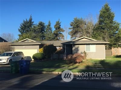 814 South 27th Street Renton, WA 98055 - Photo 1 of 1 a front view of a house with garden
