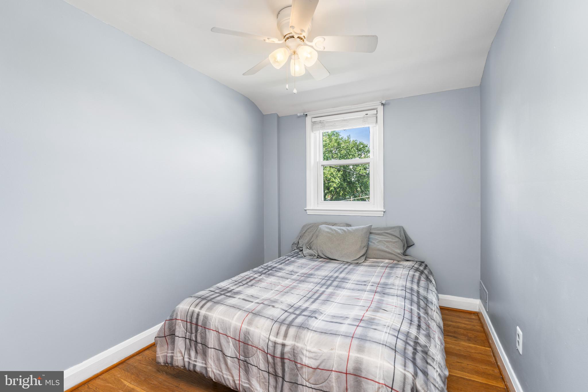 1606 Loch Ness Road Baltimore, MD 21286 - Photo 18 of 36 a bedroom with a bed and a window