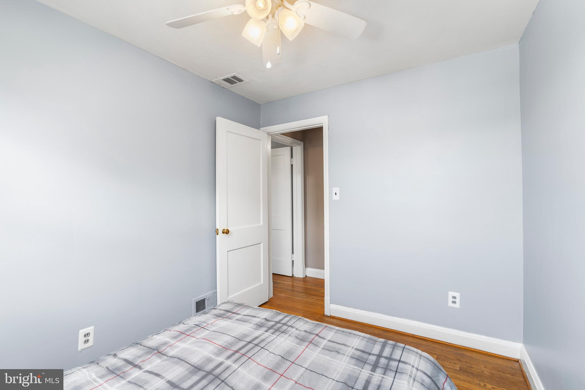 1606 Loch Ness Road Baltimore, MD 21286 - Photo 19 of 36 a view of empty room with wooden floor