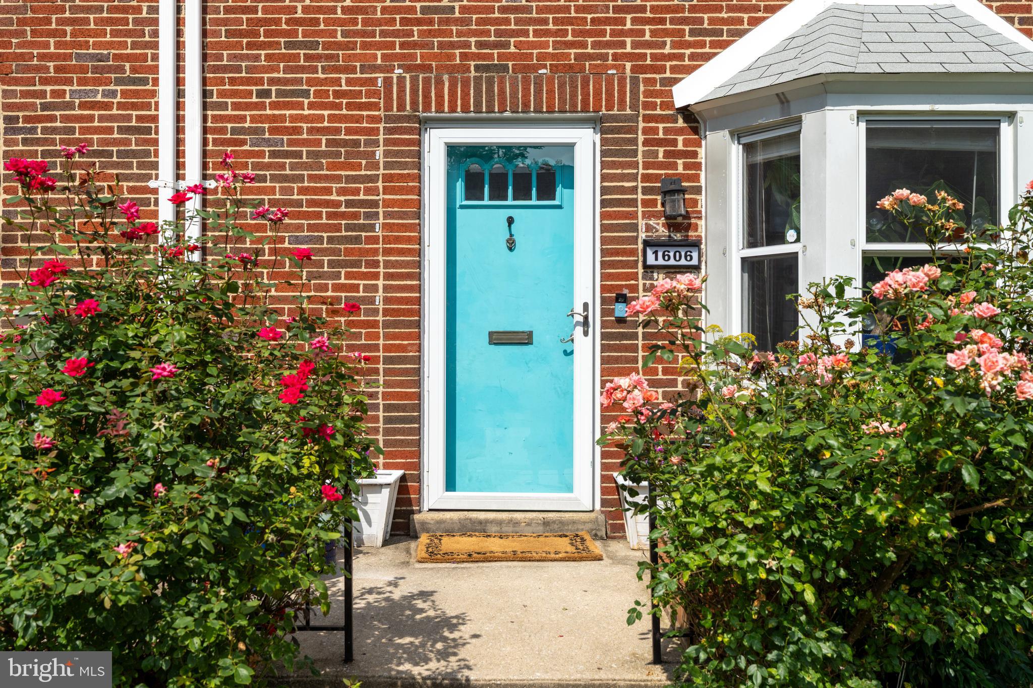 1606 Loch Ness Road Baltimore, MD 21286 - Photo 2 of 36 a front view of a house with a potted plant and windows