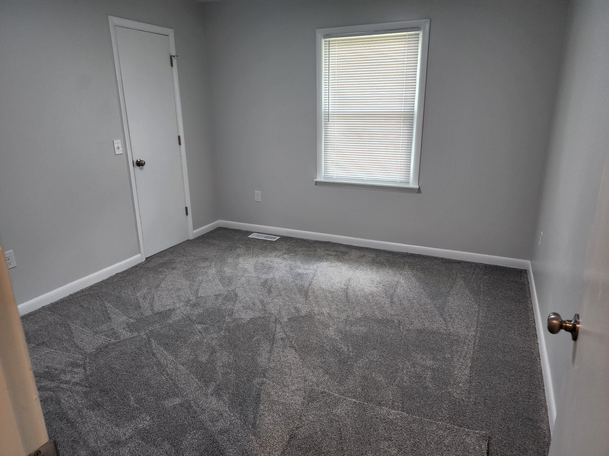 514 West Point Road Lawrenceburg, TN 38464 - Photo 12 of 25 an empty room with a window