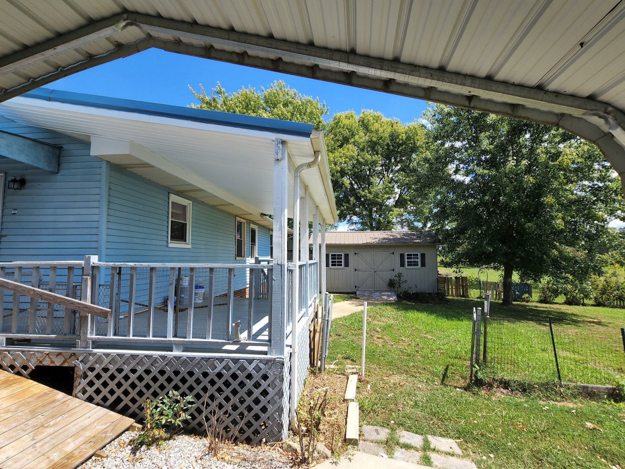 514 West Point Road Lawrenceburg, TN 38464 - Photo 24 of 25 a view of a house with backyard