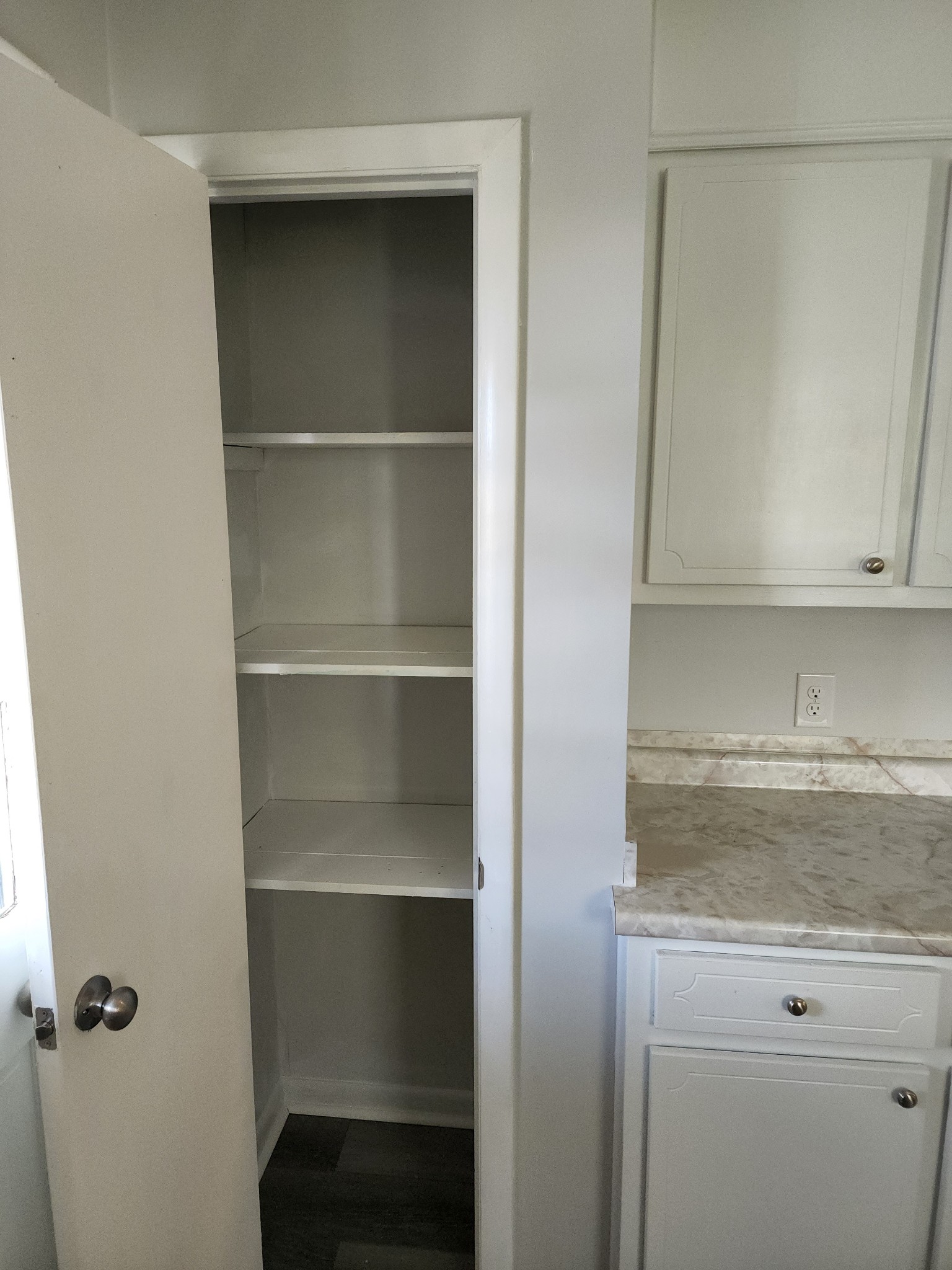 514 West Point Road Lawrenceburg, TN 38464 - Photo 10 of 25 a view of walk in closet with empty racks
