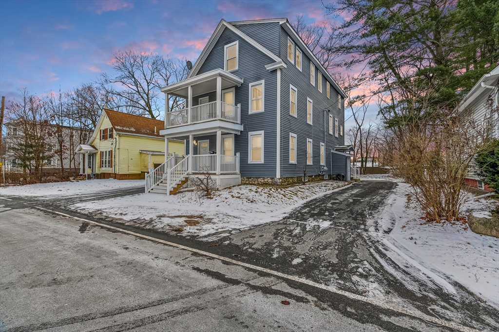 184 Myrtle Street Brockton, MA 02301 - Photo 1 of 41 a front view of a house with a yard