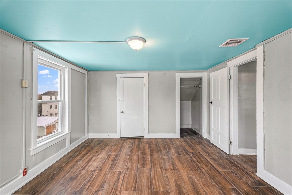 184 Myrtle Street Brockton, MA 02301 - Photo 13 of 41 a view of hallway with wooden floor