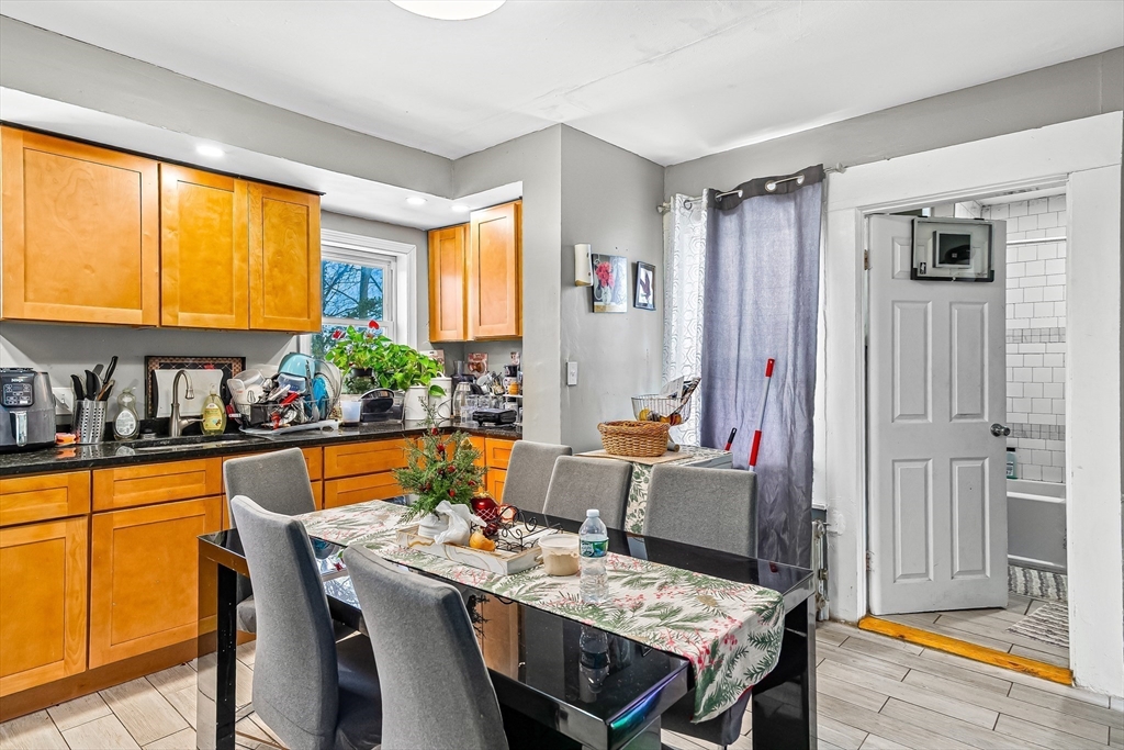 184 Myrtle Street Brockton, MA 02301 - Photo 20 of 41 a view of a dining room with furniture window and wooden floor