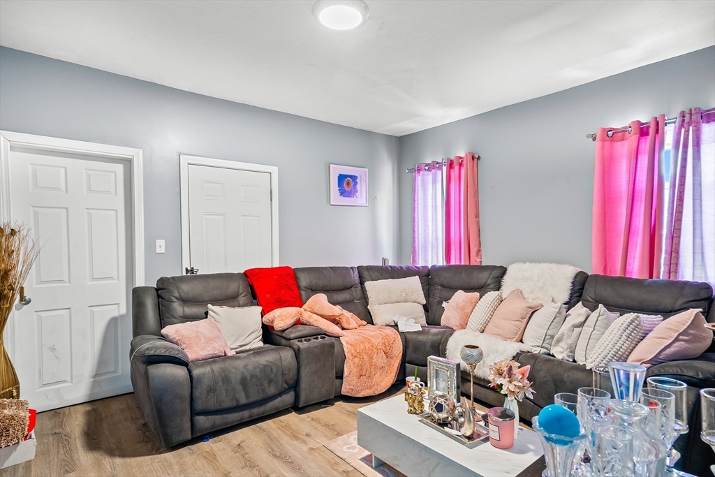 184 Myrtle Street Brockton, MA 02301 - Photo 21 of 41 a living room with furniture and a couch