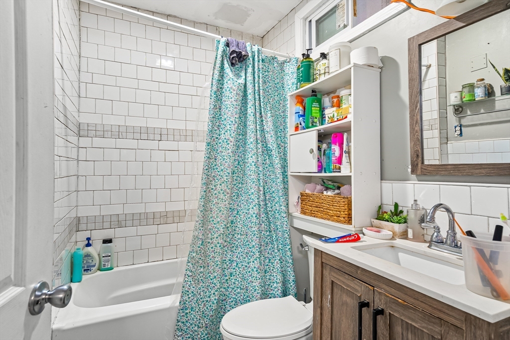 184 Myrtle Street Brockton, MA 02301 - Photo 25 of 41 a bathroom with a sink toilet and shower