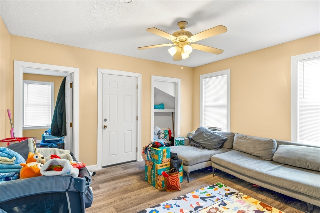 184 Myrtle Street Brockton, MA 02301 - Photo 26 of 41 a living room with furniture and wooden floor