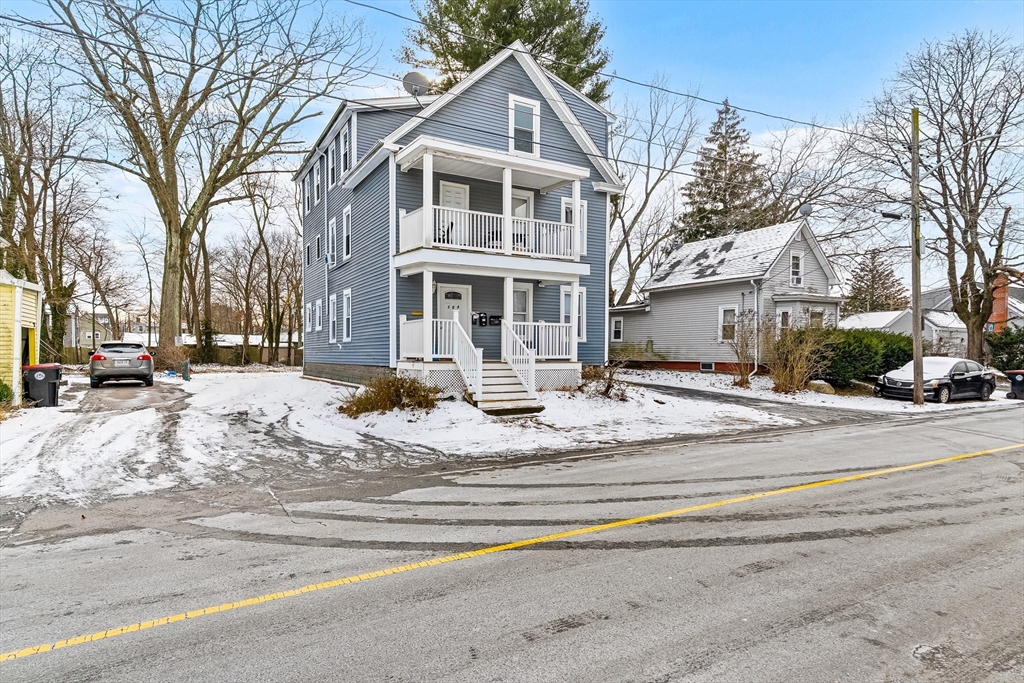 184 Myrtle Street Brockton, MA 02301 - Photo 3 of 41 a view of white house with a snow on the road