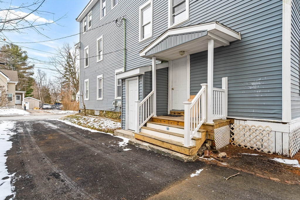 184 Myrtle Street Brockton, MA 02301 - Photo 38 of 41 a view of a house with a snow on the road