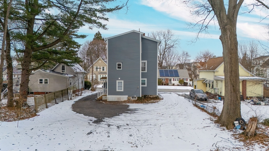 184 Myrtle Street Brockton, MA 02301 - Photo 4 of 41 a backyard of a house with yard and outdoor seating