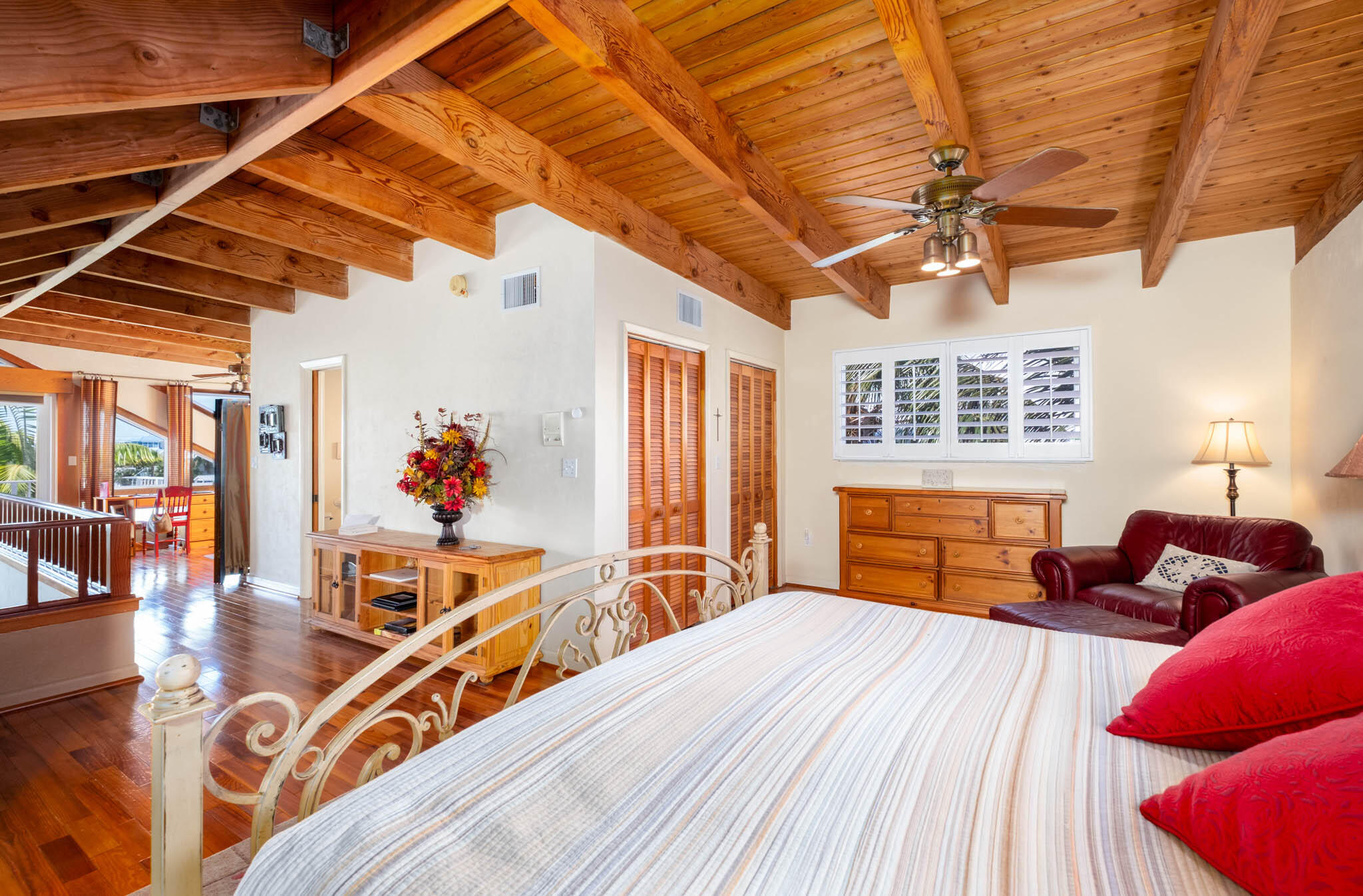 149 Lake Road Tavernier, FL 33070 - Photo 19 of 59 a bedroom with furniture and a large window