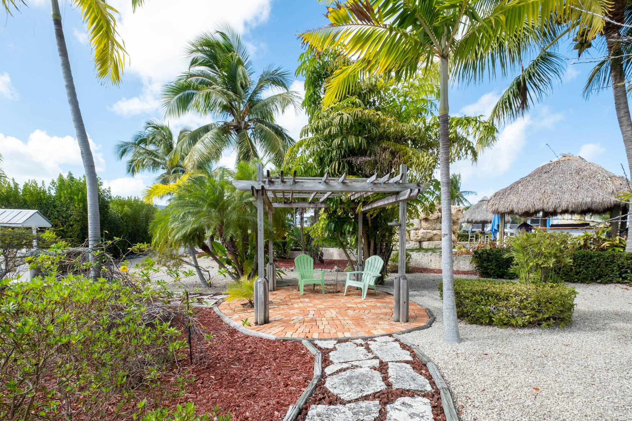 149 Lake Road Tavernier, FL 33070 - Photo 2 of 59 Take a right to the pergola