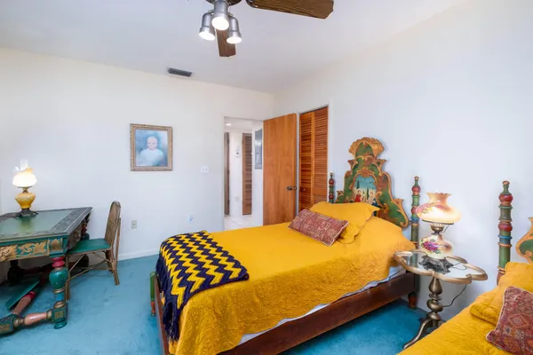 a house with a table and chairs in patio