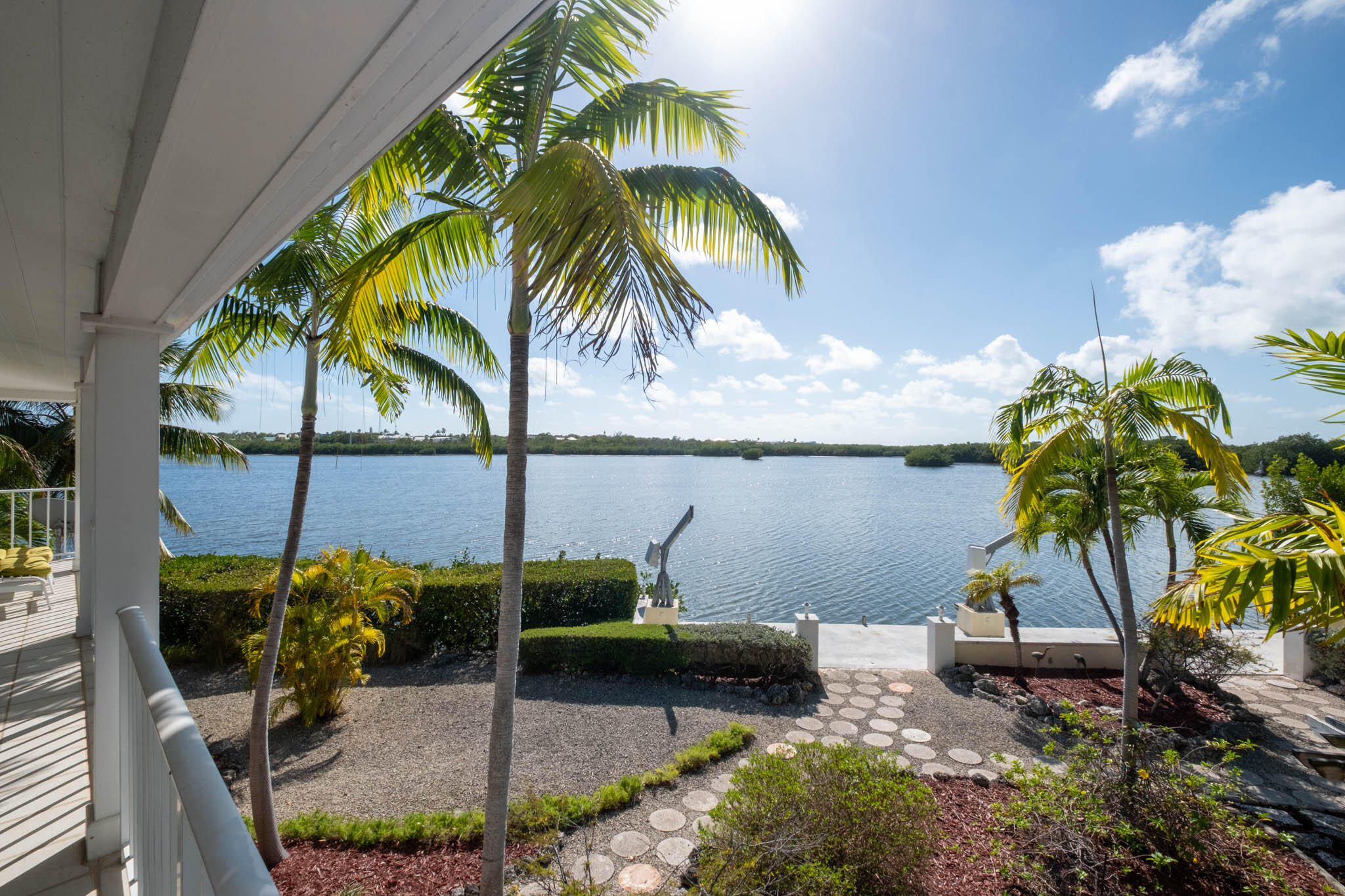 149 Lake Road Tavernier, FL 33070 - Photo 38 of 59 a view of a lake with a palm tree