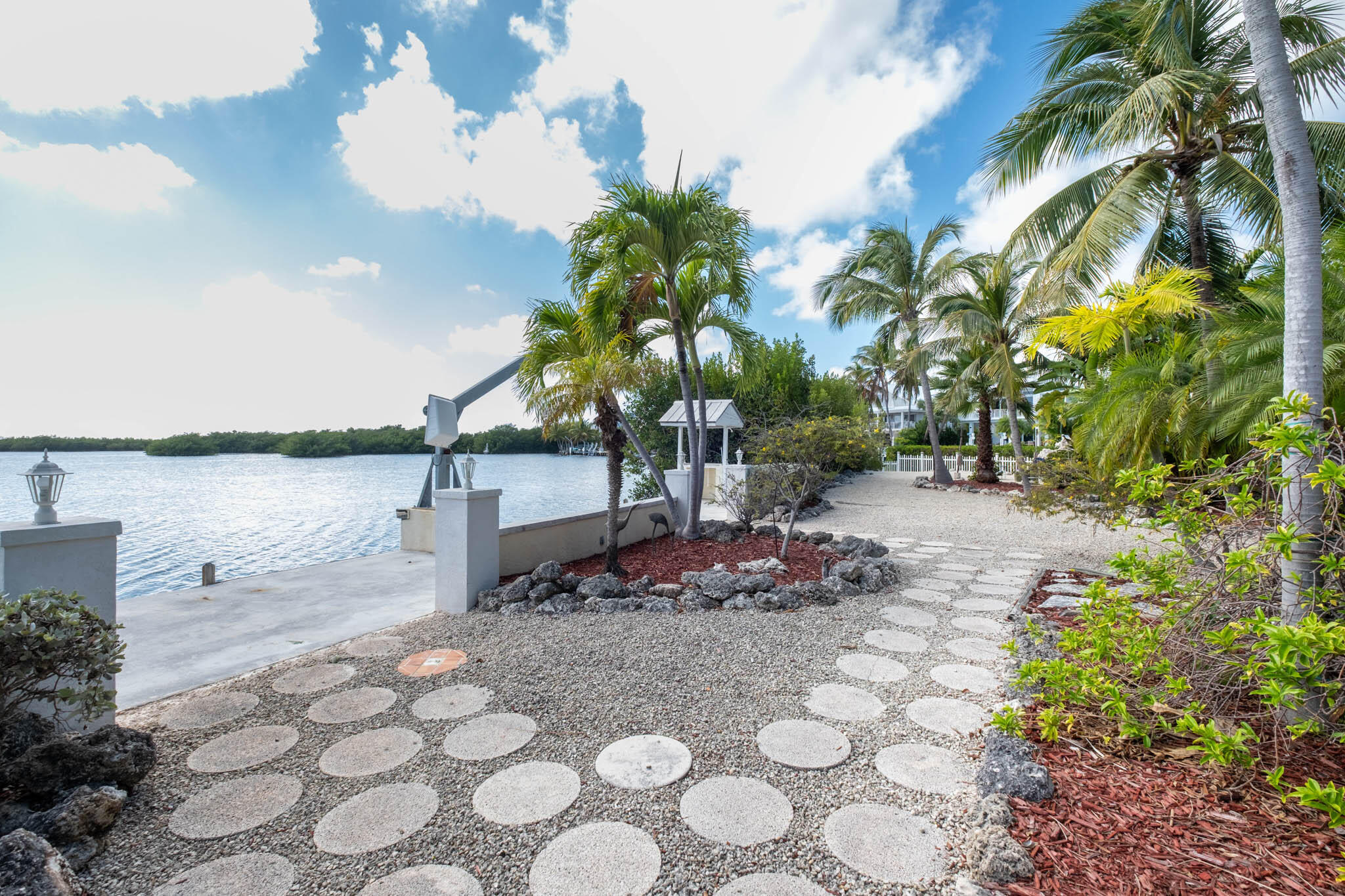 149 Lake Road Tavernier, FL 33070 - Photo 43 of 59 a view of a terrace with a garden