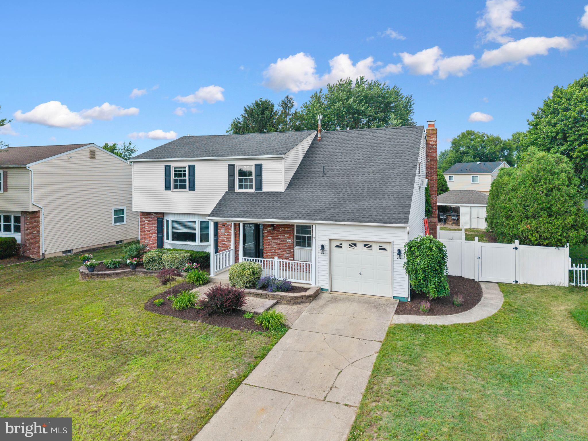 8 Chesterfield Road Sewell, NJ 08080 - Photo 48 of 57 a front view of a house with garden