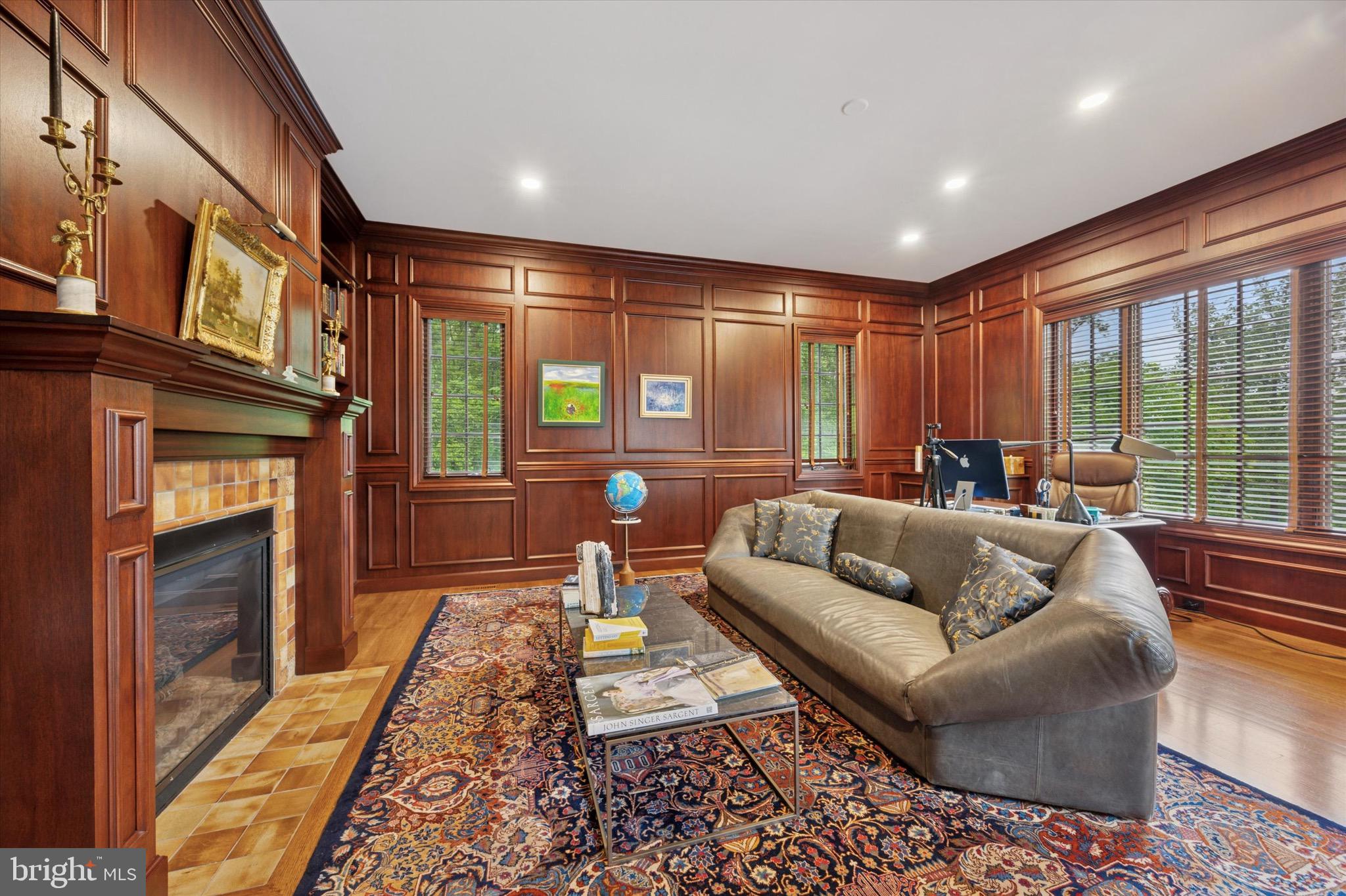 631 Harts Ridge Road Conshohocken, PA 19428 - Photo 12 of 62 a living room with furniture fireplace and flat screen tv