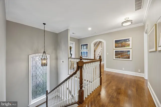 a large bedroom with a bed and a fireplace