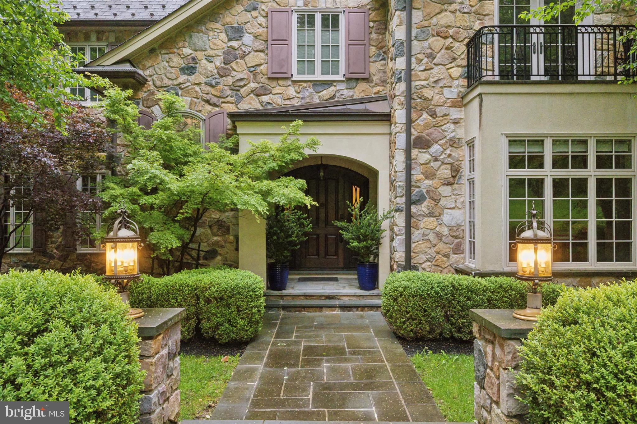 631 Harts Ridge Road Conshohocken, PA 19428 - Photo 3 of 62 a front view of a house with garden