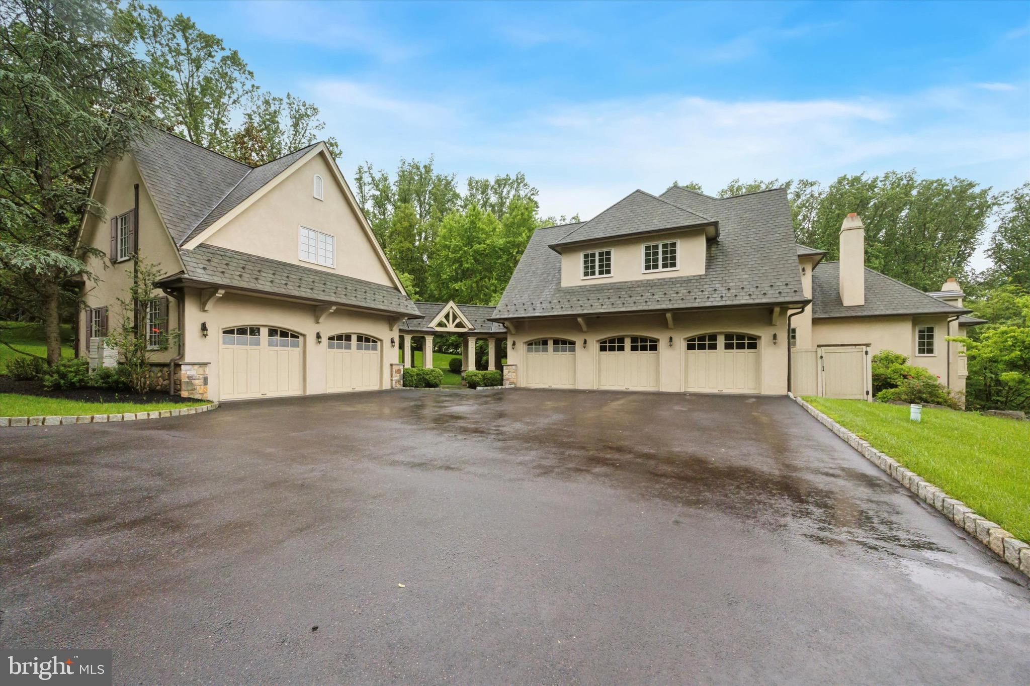 631 Harts Ridge Road Conshohocken, PA 19428 - Photo 50 of 62 a view of a house with a yard and potted plants