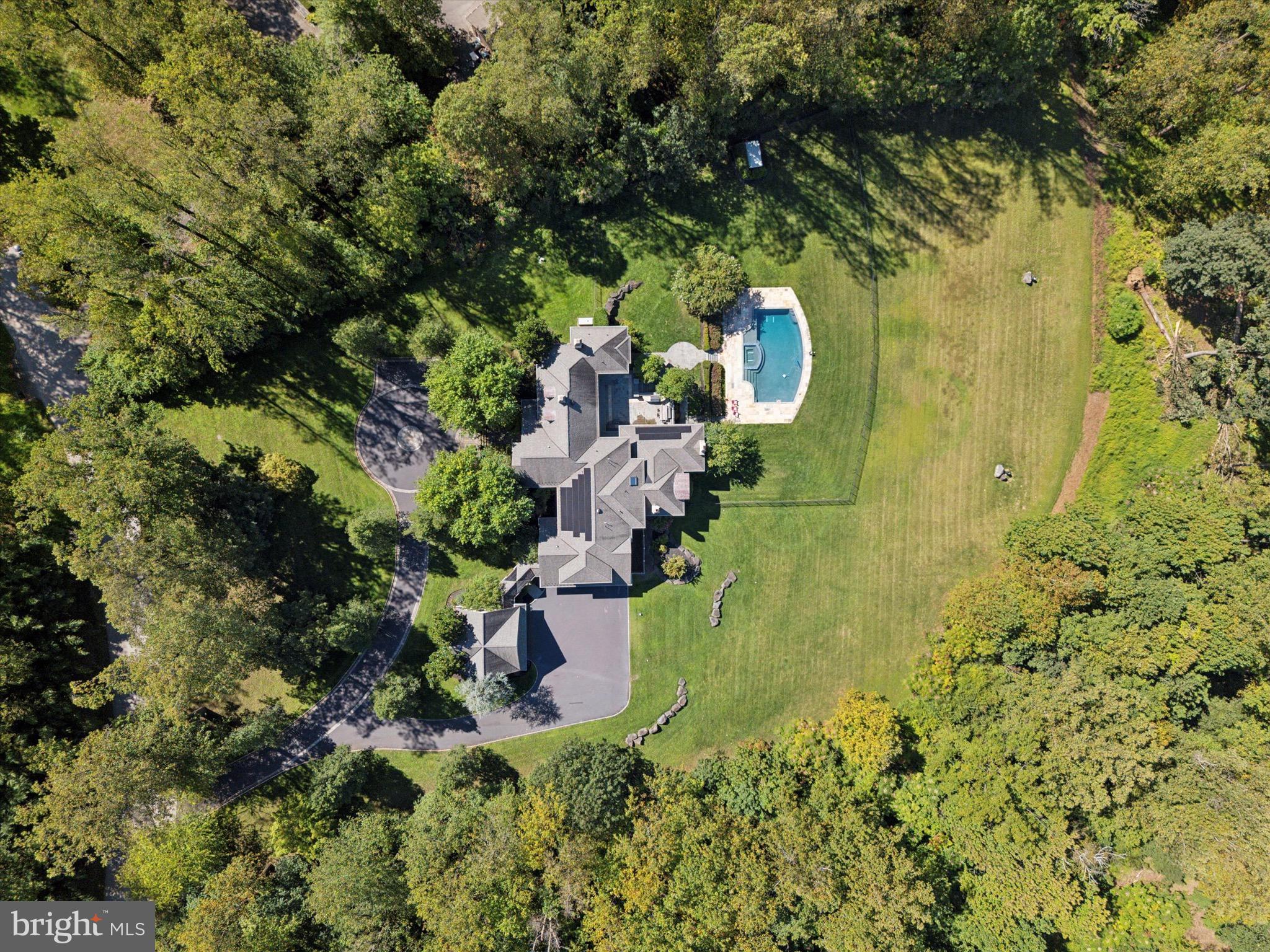 631 Harts Ridge Road Conshohocken, PA 19428 - Photo 51 of 62 a backyard of a house with lots of green space