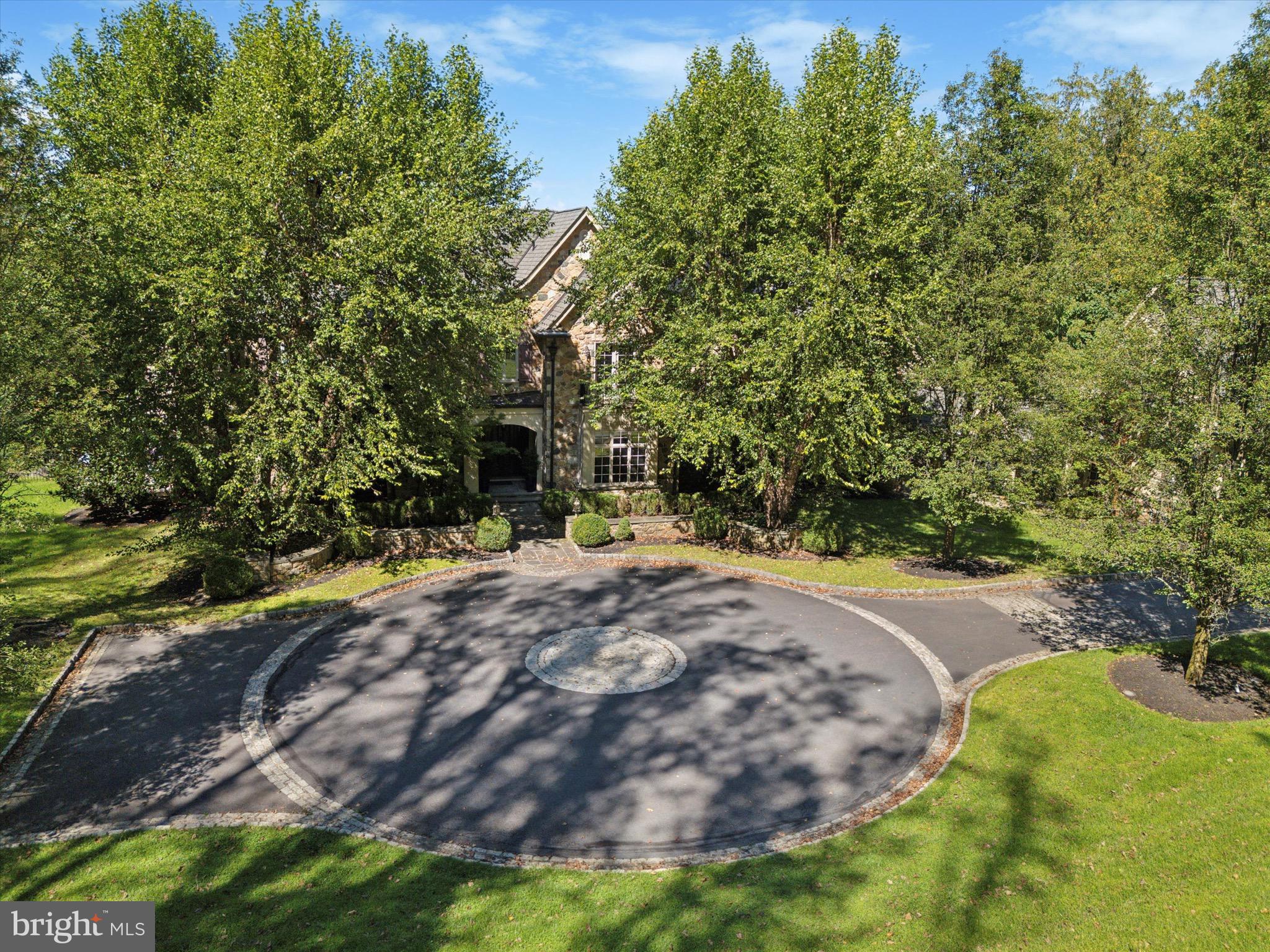 631 Harts Ridge Road Conshohocken, PA 19428 - Photo 60 of 62 a view of a backyard with large trees