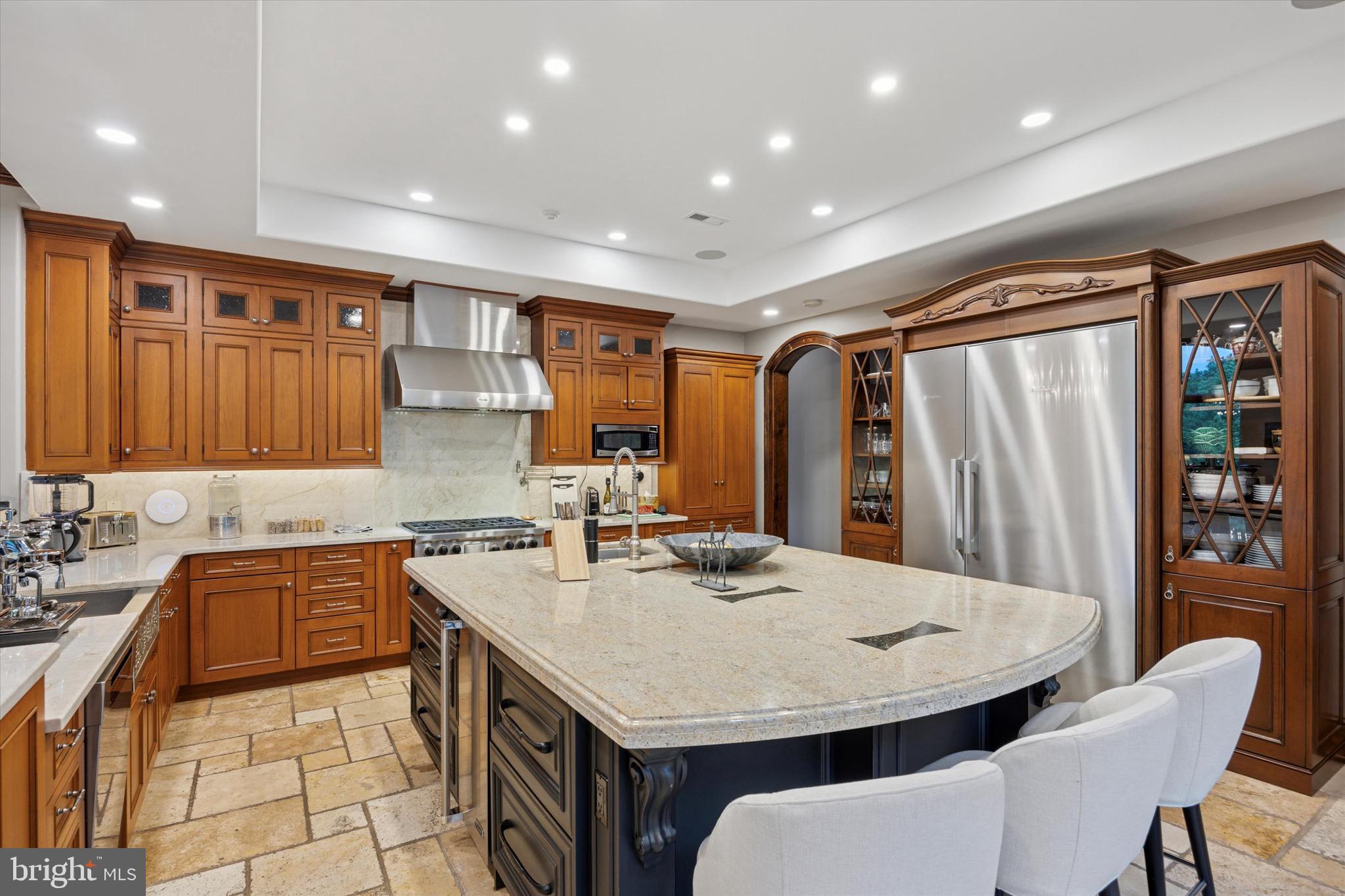 631 Harts Ridge Road Conshohocken, PA 19428 - Photo 8 of 62 a kitchen with a sink refrigerator and cabinets