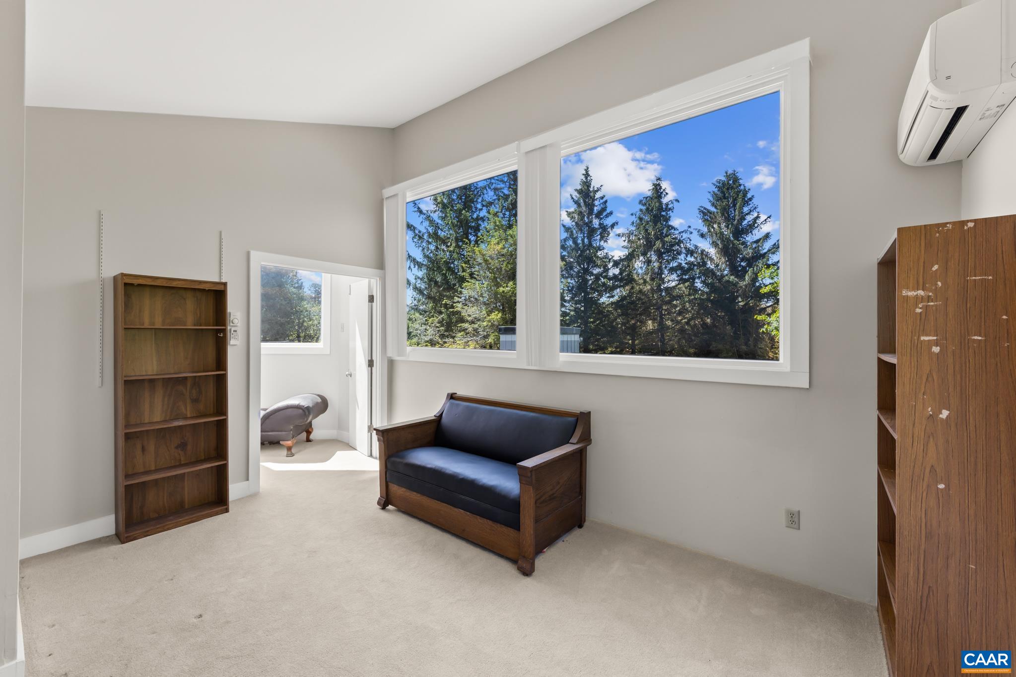 7098 Bucks Elbow Mountain Road Crozet, VA 22932 - Photo 40 of 57 a living room with furniture and a window