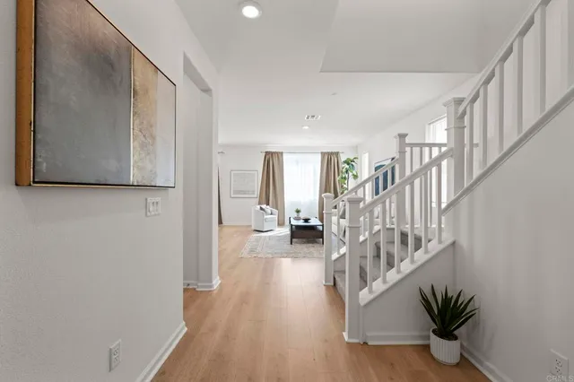 a view of entryway with wooden floor