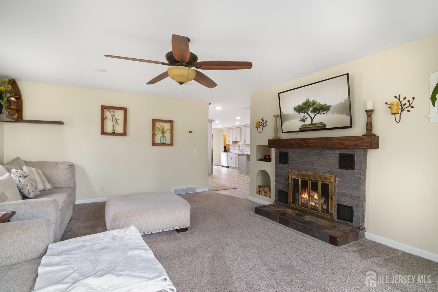 238 Princeton Hightstown Road Cranbury, NJ 08512 - Photo 15 of 51 a living room with furniture and a fireplace