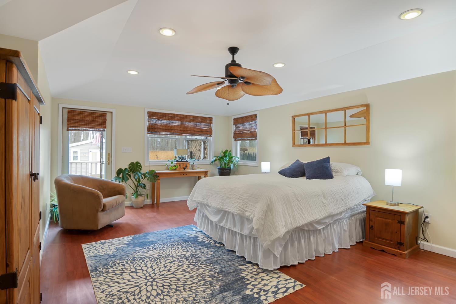 238 Princeton Hightstown Road Cranbury, NJ 08512 - Photo 18 of 51 a bedroom with a bed a couch and dresser