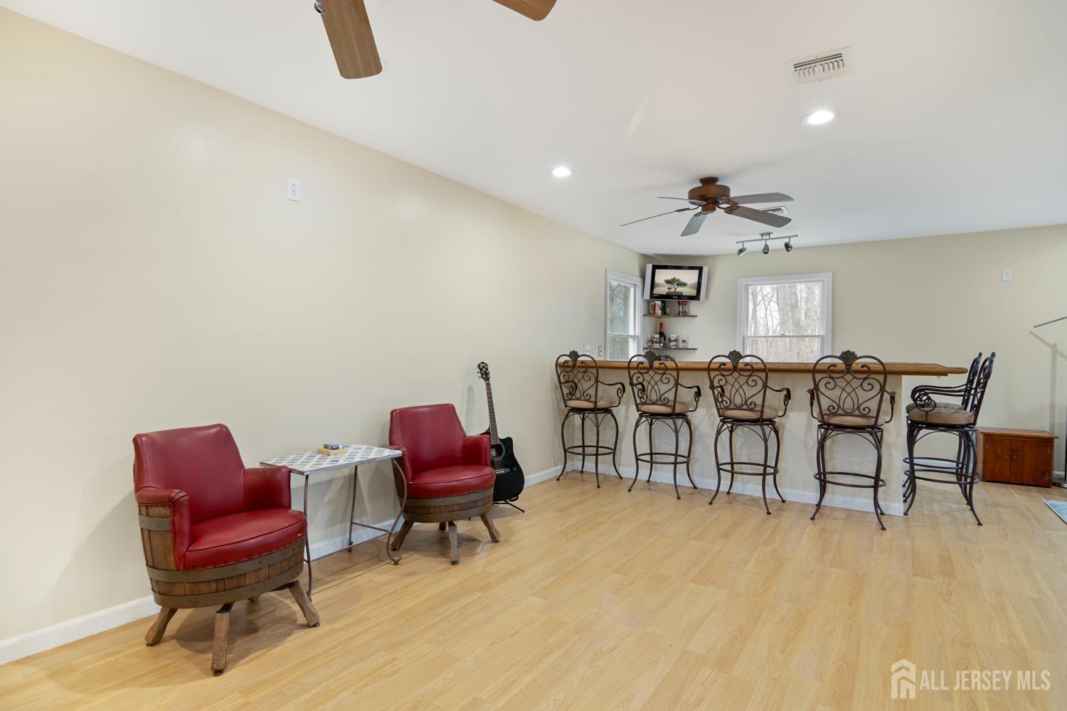238 Princeton Hightstown Road Cranbury, NJ 08512 - Photo 26 of 51 a view of a livingroom with furniture and a chair
