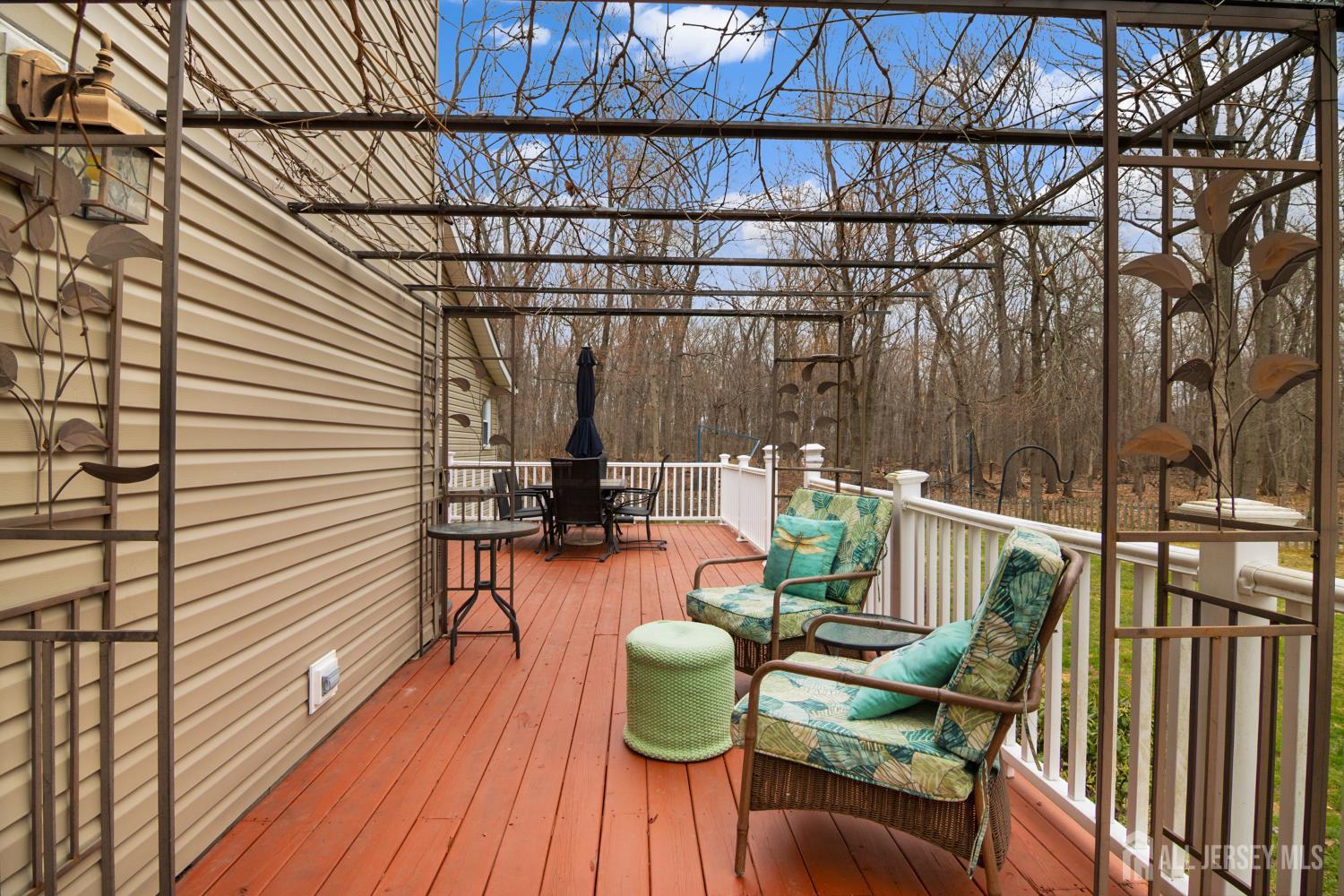 238 Princeton Hightstown Road Cranbury, NJ 08512 - Photo 37 of 51 a balcony with chairs and with wooden floor