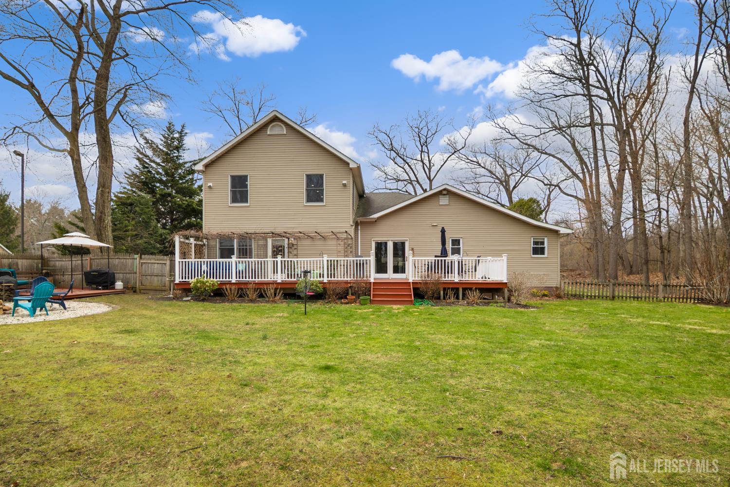 238 Princeton Hightstown Road Cranbury, NJ 08512 - Photo 39 of 51 a view of a house with a yard and large trees