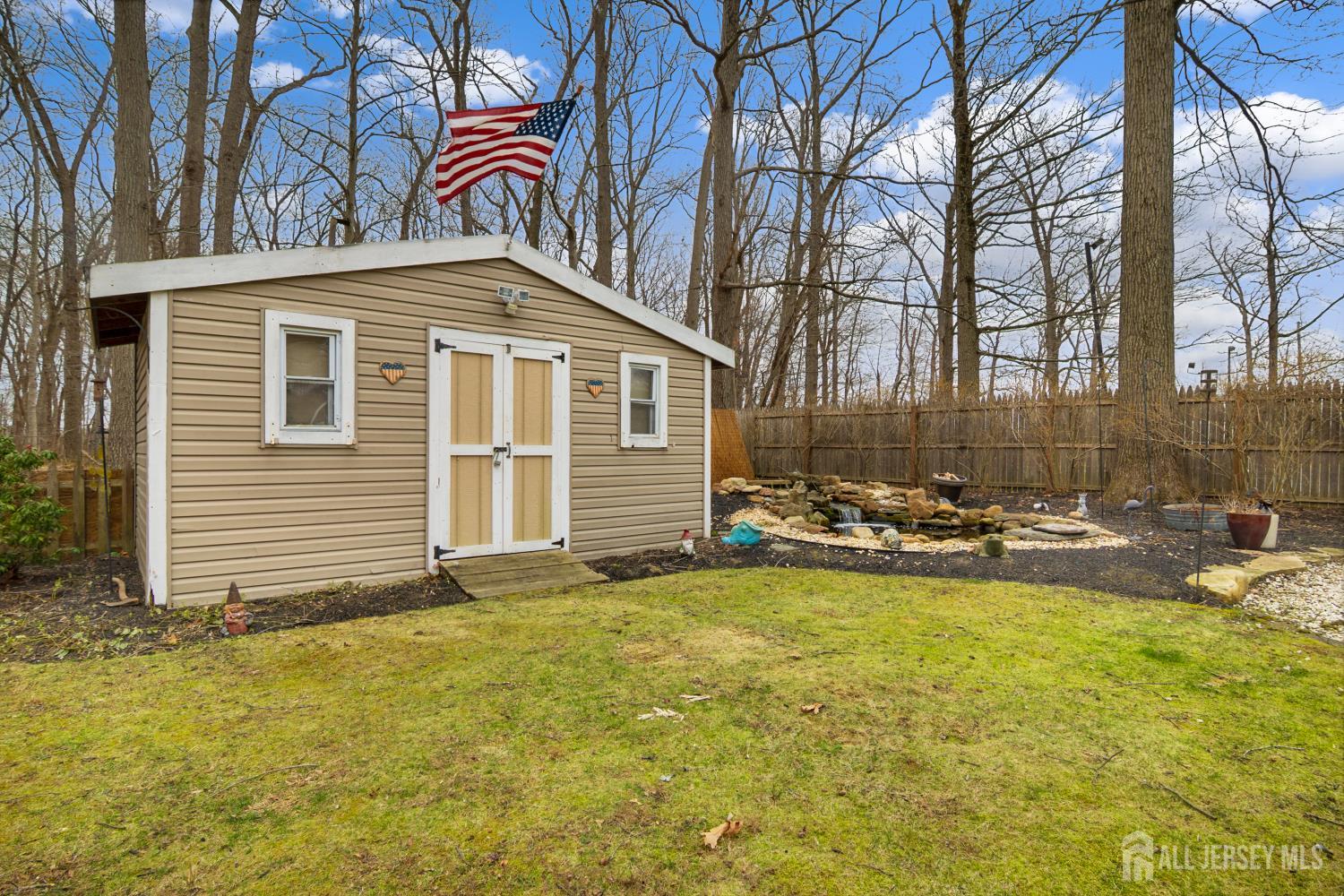 238 Princeton Hightstown Road Cranbury, NJ 08512 - Photo 40 of 51 a view of a house with swimming pool and sitting area