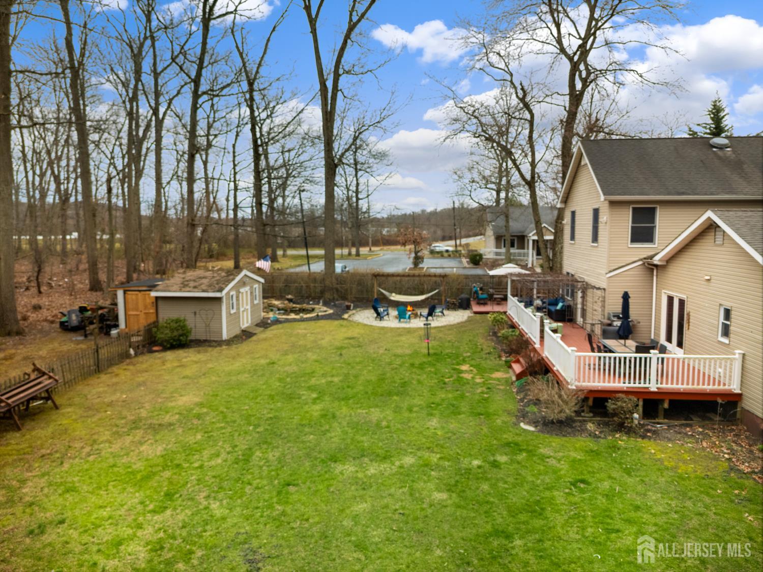 238 Princeton Hightstown Road Cranbury, NJ 08512 - Photo 45 of 51 a backyard of a house with table and chairs