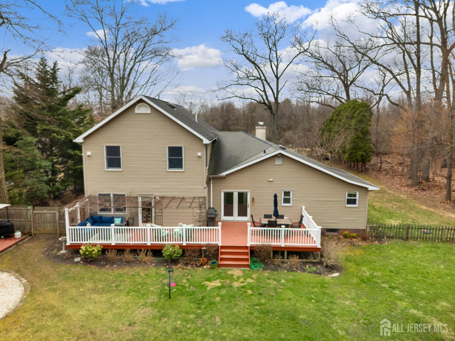 238 Princeton Hightstown Road Cranbury, NJ 08512 - Photo 46 of 51 a front view of a house with a yard table and chairs