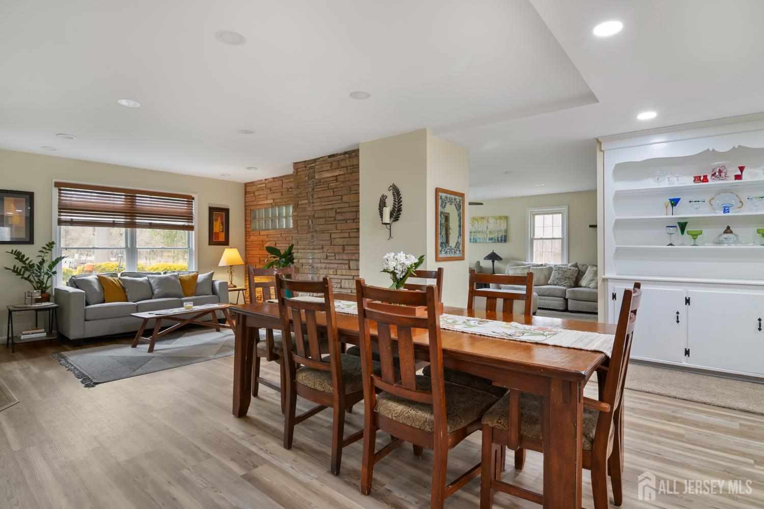 238 Princeton Hightstown Road Cranbury, NJ 08512 - Photo 6 of 51 a view of a dining room with furniture and wooden floor