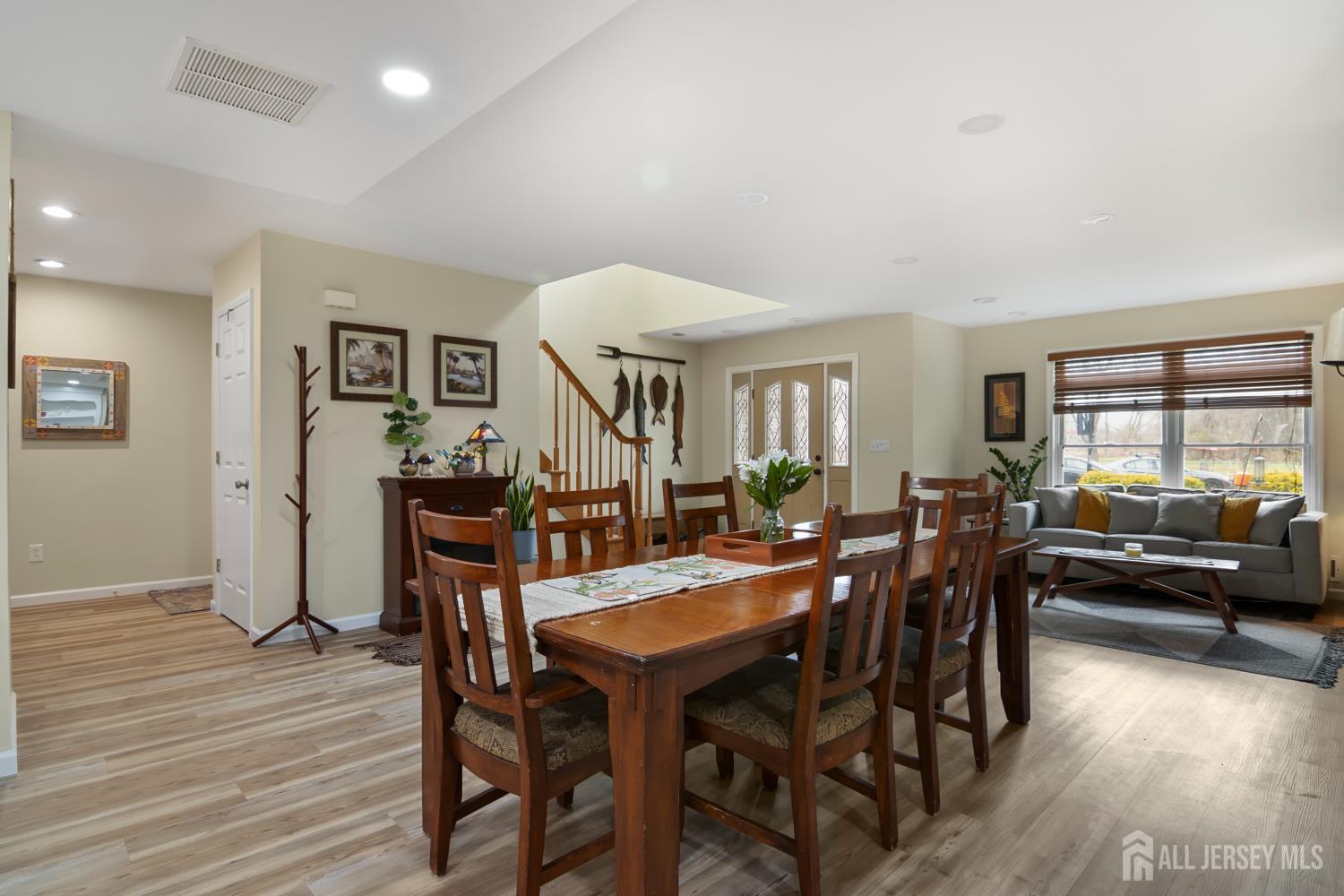 238 Princeton Hightstown Road Cranbury, NJ 08512 - Photo 7 of 51 a view of a dining room with furniture and wooden floor