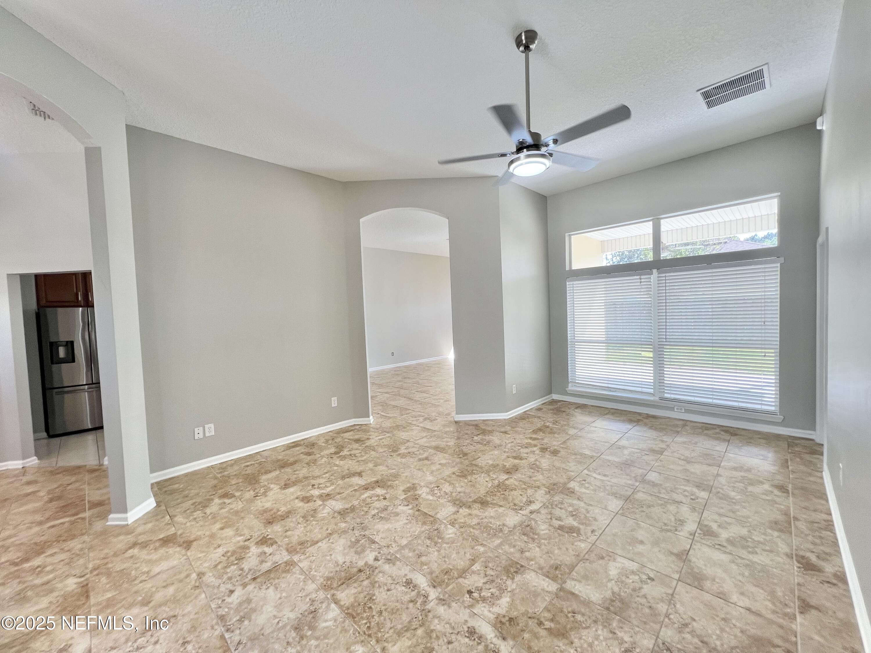 389 Sparrow Branch Circle St. Johns, FL 32259 - Photo 15 of 46 a view of an empty room with a window