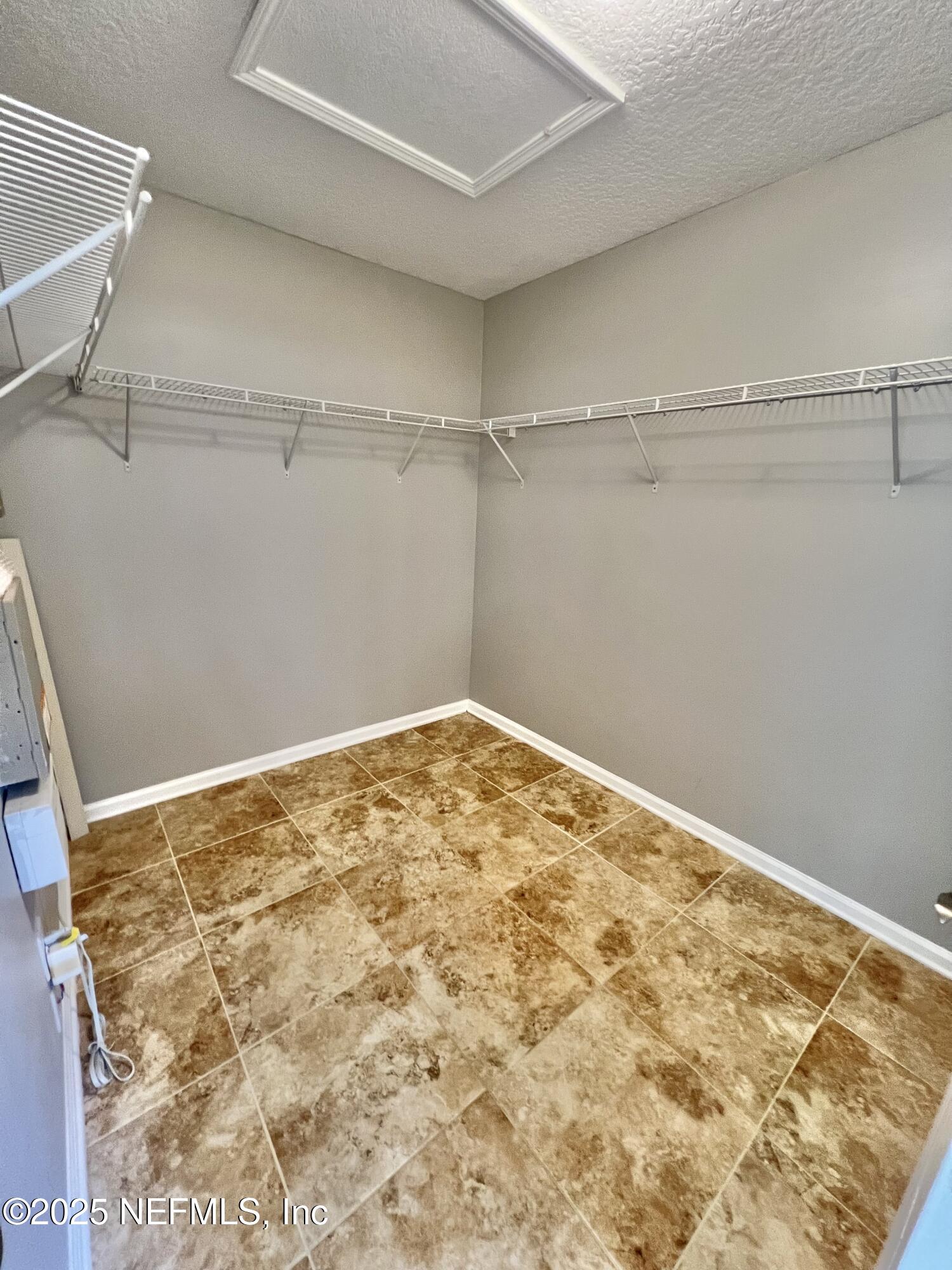 389 Sparrow Branch Circle St. Johns, FL 32259 - Photo 19 of 46 a view of a room with shelf