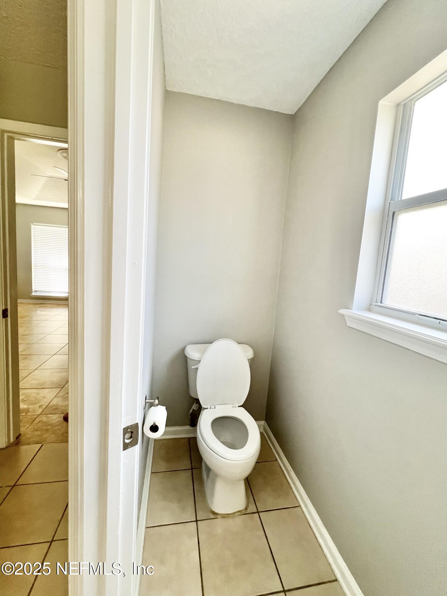 389 Sparrow Branch Circle St. Johns, FL 32259 - Photo 24 of 46 a bathroom with a toilet