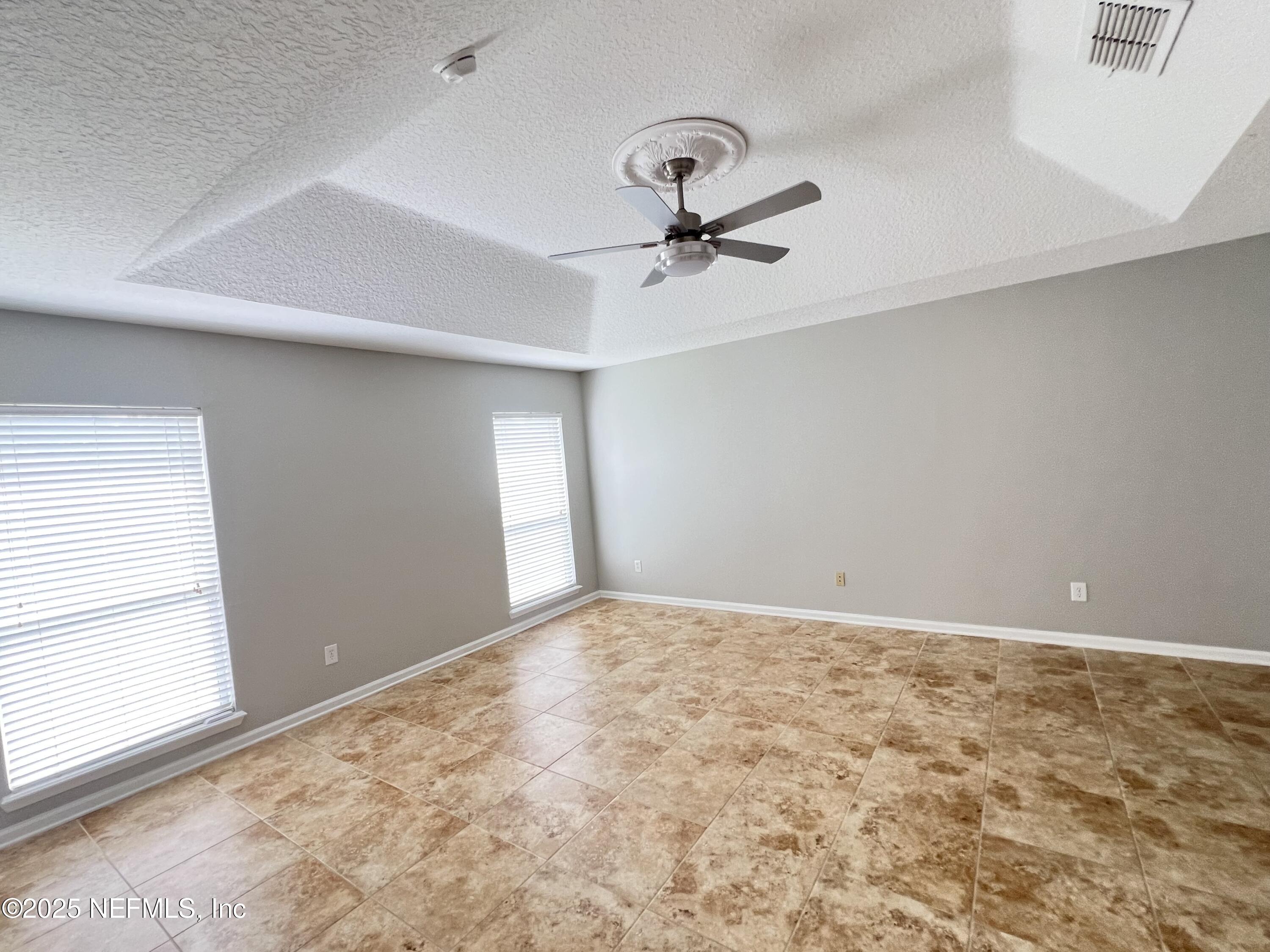389 Sparrow Branch Circle St. Johns, FL 32259 - Photo 25 of 46 a view of an empty room and a window