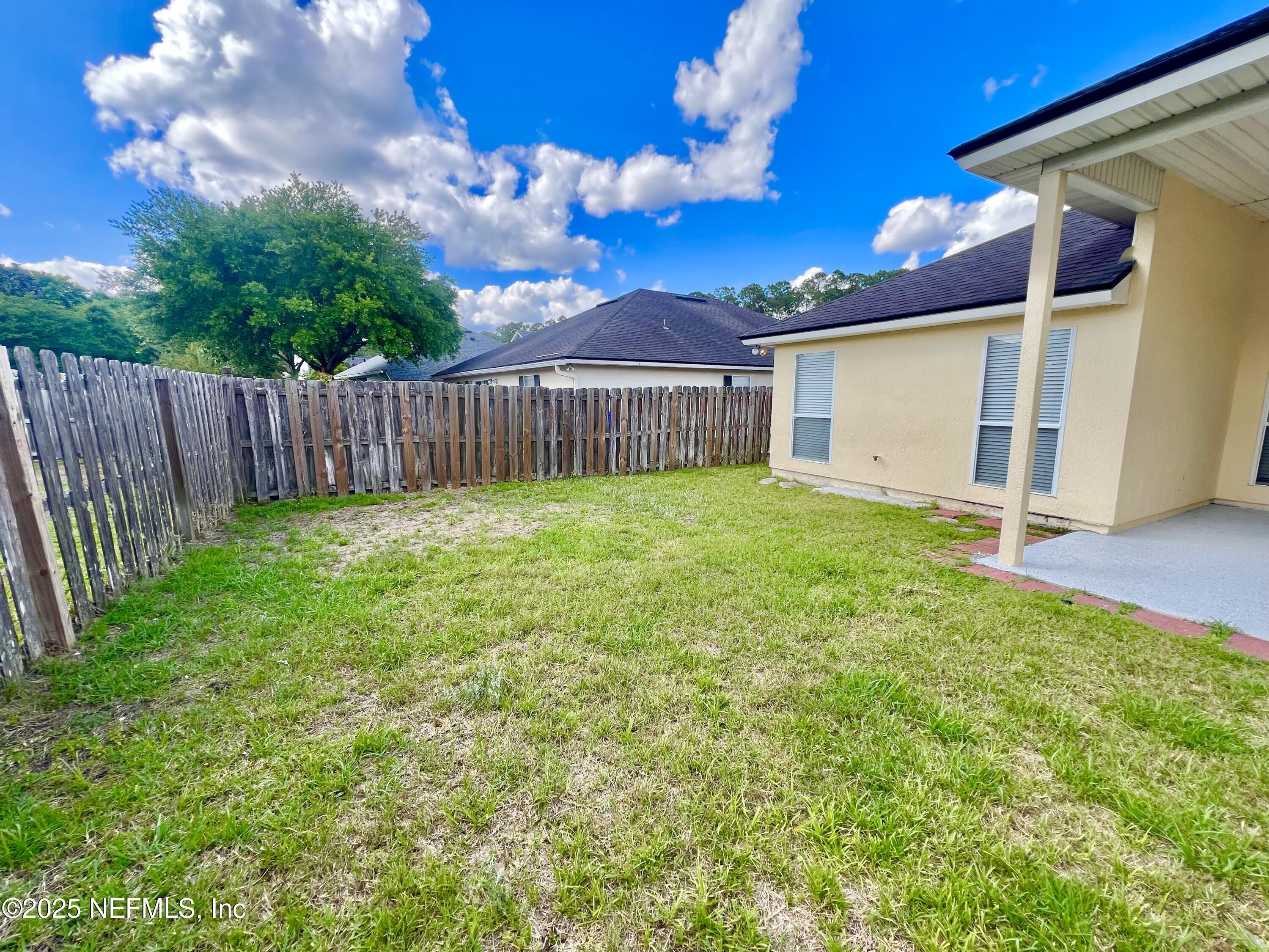 389 Sparrow Branch Circle St. Johns, FL 32259 - Photo 37 of 46 a view of a backyard of the house