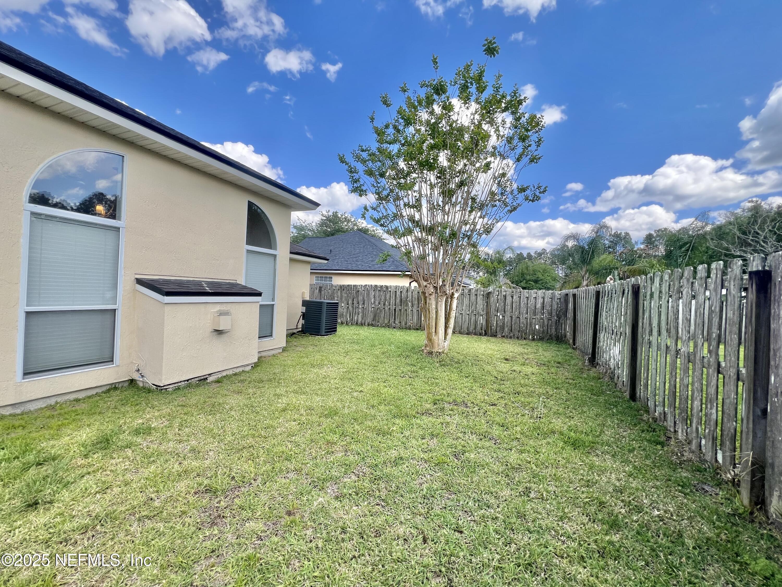 389 Sparrow Branch Circle St. Johns, FL 32259 - Photo 40 of 46 a house with garden in front of it