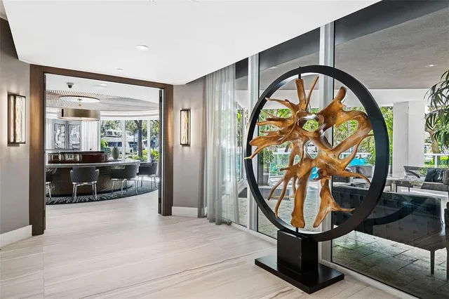 a view of an entryway with wooden floor