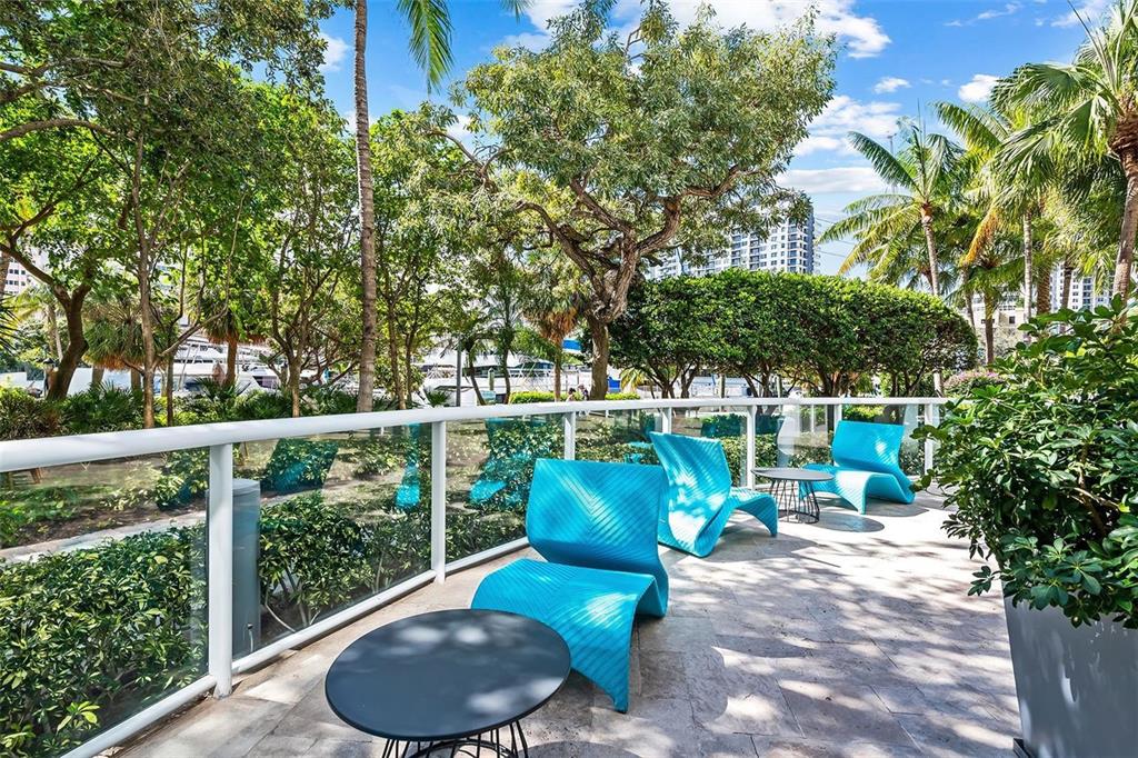 333 Las Olas Way, Unit 2803 Fort Lauderdale, FL 33301 - Photo 7 of 25 a view of a chair and tables in the balcony