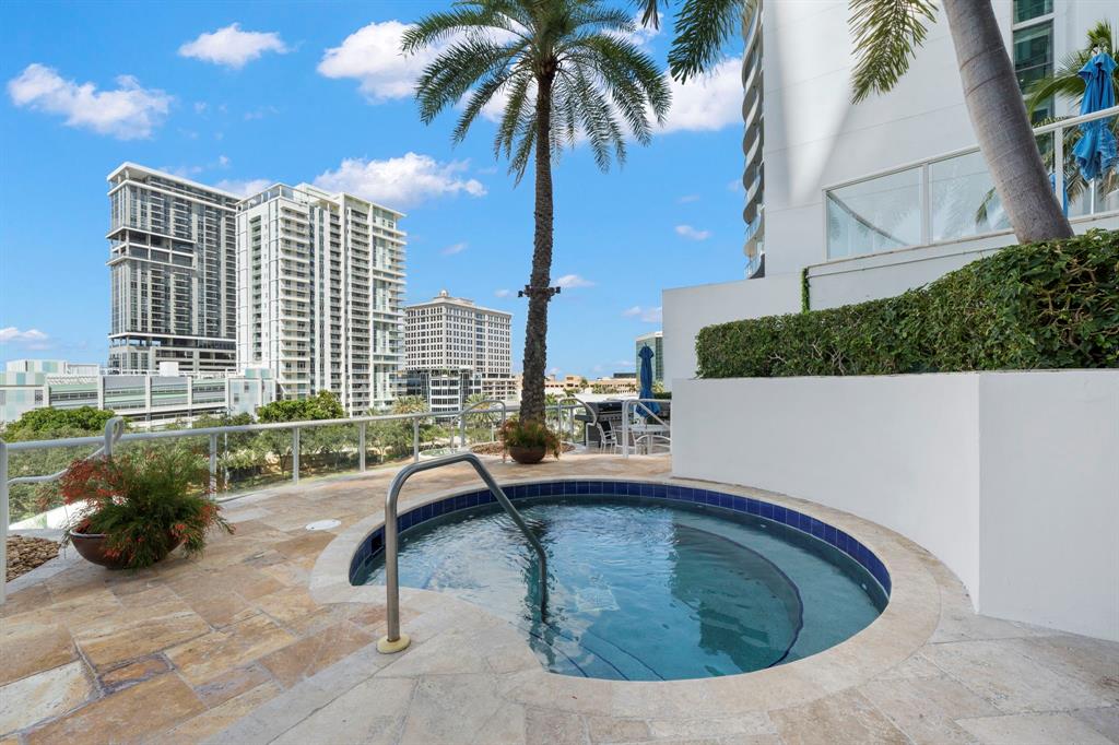 333 Las Olas Way, Unit 2803 Fort Lauderdale, FL 33301 - Photo 9 of 25 a view of a swimming pool with a patio